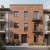 freepik__apply-realistic-brick-tiles-onto-the-facade-of-a-m__62987.jpeg